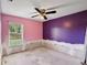 View of the bedroom with a ceiling fan and a window at 4025 Meadow Run Ln, Wesley Chapel, FL 33543