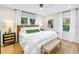Bright bedroom with a large bed, modern furniture, and natural light, creating a relaxing and inviting atmosphere at 420 S Matanzas Ave, Tampa, FL 33609