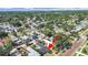 Aerial view of neighborhood showcasing property, mature trees, and nearby residential streets at 4426 4Th N Ave, St Petersburg, FL 33713