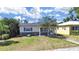 Charming single-story home with a manicured lawn and welcoming front porch, perfect for relaxation at 4426 4Th N Ave, St Petersburg, FL 33713