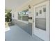 Close up of the home's front door and porch, highlighting architectural details and curb appeal at 4426 4Th N Ave, St Petersburg, FL 33713