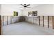 This bedroom has large windows, providing ample natural light and outdoor views, ready for renovation at 4901 Venetian Ne Blvd, St Petersburg, FL 33703