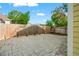 Private backyard with a paved patio area and a wooden fence, offering a serene outdoor space at 5804 N 9Th St, Tampa, FL 33604