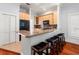 Spacious kitchen with granite countertops, breakfast bar, and stainless steel appliances at 5804 N 9Th St, Tampa, FL 33604