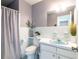 Charming bathroom with blue accents, featuring a unique sink and well-maintained fixtures at 6251 Danbury St, Spring Hill, FL 34606