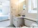 Bathroom featuring a green sink and a view into an adjacent bedroom at 6251 Danbury St, Spring Hill, FL 34606