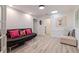 Cozy living room featuring a plush sofa, skylight, and stylish decor at 7108 Pelican Island Dr, Tampa, FL 33634