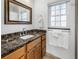 Clean bathroom with marble countertop and decorative towels at 826 Glades Ne Ct, St Petersburg, FL 33702