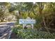 The Isle of Caya Costa is a neighborhood with lush landscaping near the road at 826 Glades Ne Ct, St Petersburg, FL 33702