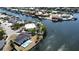 Waterfront property with a pool and boat dock, nestled in a beautiful canal community at 926 Eagle Ln, Apollo Beach, FL 33572