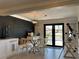 Dining area featuring modern decor, a view of the water, and a telescope for waterfront viewing at 926 Eagle Ln, Apollo Beach, FL 33572