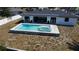 Backyard pool with spa featuring modern design, perfect for outdoor relaxation at 926 Eagle Ln, Apollo Beach, FL 33572