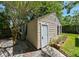 Backyard features a small storage house with lovely landscaping at 101 22Nd N Ave, St Petersburg, FL 33704