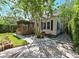 Charming home featuring a screened porch and attractive landscaping at 101 22Nd N Ave, St Petersburg, FL 33704