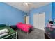 Bedroom with two beds and a closet at 10511 Mistflower Ln, Tampa, FL 33647