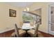 Dining area offering views of the pool and backyard at 10511 Mistflower Ln, Tampa, FL 33647