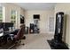 Bright home office featuring a workspace, ample storage, and a padded punching bag for exercise at 10511 Mistflower Ln, Tampa, FL 33647