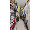 Spacious walk-in closet with built-in shelving and clothing racks, offering ample storage space at 10511 Mistflower Ln, Tampa, FL 33647