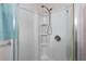 Bathroom stall with a shower head and shelves at 1099 7Th Ne Ave, Largo, FL 33770