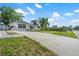 Charming single-story home with driveway and well-maintained lawn at 1099 7Th Ne Ave, Largo, FL 33770