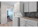 Efficient laundry area featuring a stackable washer and dryer at 1099 7Th Ne Ave, Largo, FL 33770