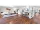 Spacious living room and kitchen combo; great entertaining space with hardwood floors and bright natural light at 1220 Pinellas Point S Dr, St Petersburg, FL 33705