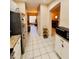 Bright kitchen features stainless steel appliances and an open layout to the living area at 12367 Foxmoor Peak Dr, Riverview, FL 33579