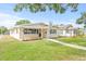 Charming home featuring a well-manicured lawn and attractive landscaping at 1323 48Th N Ave, St Petersburg, FL 33703