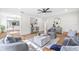 Spacious living room with contemporary furniture, modern accents, and hardwood floors at 1323 48Th N Ave, St Petersburg, FL 33703
