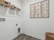 Laundry room area with shelving at 1497 Laredo Ave, Spring Hill, FL 34608