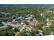 Quaint property nestled amongst the trees in a quiet residential neighborhood at 1702 E Knollwood St, Tampa, FL 33610