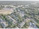 Explore this lovely apartment complex from above, with generous parking and mature landscaping at 222 Draw Bridge Ln, Valrico, FL 33594