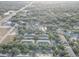 A captivating aerial view of apartments perfectly located, surrounded by lush greenery, near highway access at 222 Draw Bridge Ln, Valrico, FL 33594