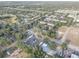 An aerial perspective displays a nicely laid out apartment complex surrounded by an array of trees and landscape features at 222 Draw Bridge Ln, Valrico, FL 33594