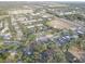 From above, admire this perfectly located apartment complex, nestled in beautiful trees with highway access nearby at 222 Draw Bridge Ln, Valrico, FL 33594