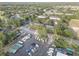 Aerial view showcases the beautiful surroundings, mature trees, and tranquil setting of the townhome community at 222 Draw Bridge Ln, Valrico, FL 33594