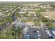 Aerial view of the townhome community surrounded by lush greenery, offering a serene and peaceful living environment at 222 Draw Bridge Ln, Valrico, FL 33594