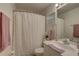 Well-lit bathroom with shower, white vanity, stylish decor, and clean design at 222 Draw Bridge Ln, Valrico, FL 33594