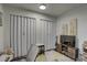 Bright, small bedroom with closet and TV area at 222 Draw Bridge Ln, Valrico, FL 33594