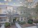 Charming townhome featuring a welcoming entrance, neutral paint and well-maintained landscaping at 222 Draw Bridge Ln, Valrico, FL 33594