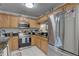 Well-appointed kitchen with stainless steel appliances, ample storage, and modern finishes at 222 Draw Bridge Ln, Valrico, FL 33594