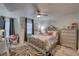 Beautiful main bedroom with elegant decor, zebra rug, and large windows at 222 Draw Bridge Ln, Valrico, FL 33594