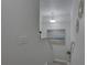 Bright staircase with a modern art piece hanging on the wall at 222 Draw Bridge Ln, Valrico, FL 33594
