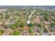 A beautiful aerial shot of this property surrounded by other single Gathering homes in a quiet neighborhood at 2235 Burlington N Ave, St Petersburg, FL 33713