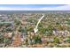 An aerial view with an arrow pointing towards the property shows its location within the surrounding neighborhood at 2235 Burlington N Ave, St Petersburg, FL 33713