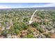 Aerial shot highlights the home's location within a tree-lined neighborhood with easy access to amenities at 2235 Burlington N Ave, St Petersburg, FL 33713