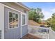 Balcony with white railings, outdoor views, door to inside, and vinyl siding at 2235 Burlington N Ave, St Petersburg, FL 33713