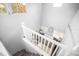 Bedroom view from upstairs showing window, lamps, bed and carpet at 2235 Burlington N Ave, St Petersburg, FL 33713