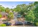 A quaint home with a well-manicured lawn and mature trees adds to the curb appeal of this charming residence at 2235 Burlington N Ave, St Petersburg, FL 33713