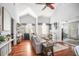Open-concept living area with vaulted ceilings, hardwood floors, and ample natural light at 2235 Burlington N Ave, St Petersburg, FL 33713